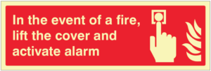 In the event of a fire lift cover and activate alarm